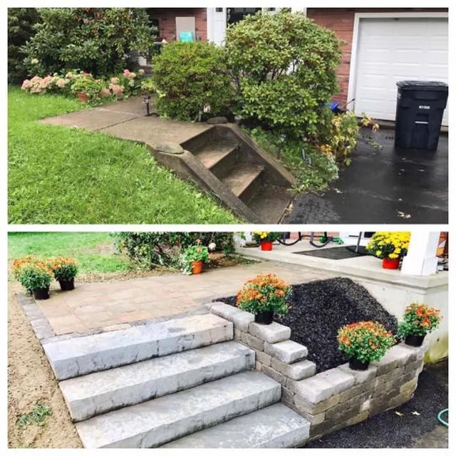 Stone steps between planted and mulched beds.